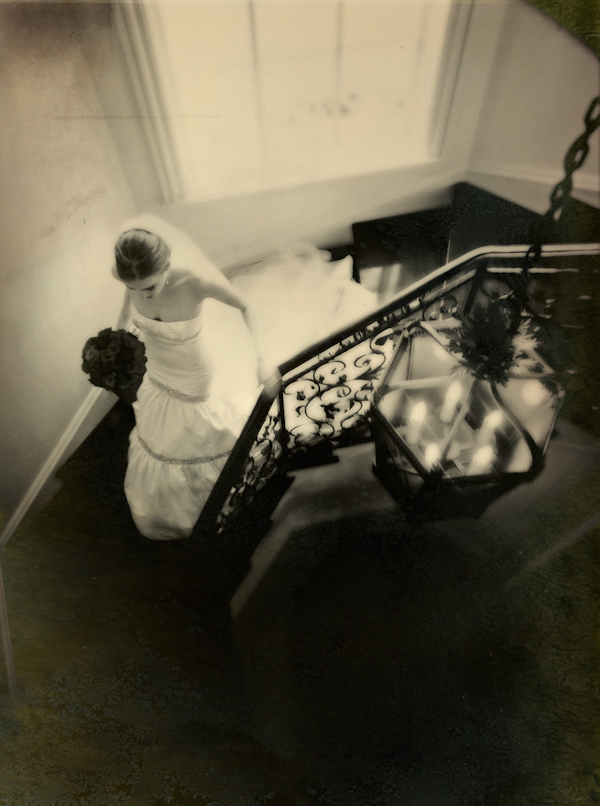wedding photo of bride on stairs by Jeffrey and Julia Woods